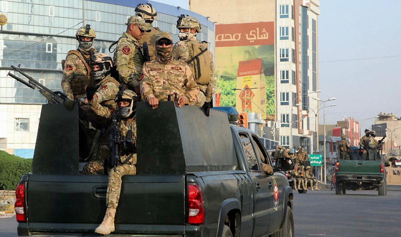 Iraqi+soldiers+patrol+the+streets+of+Basra+after+days+of+violent+protests.