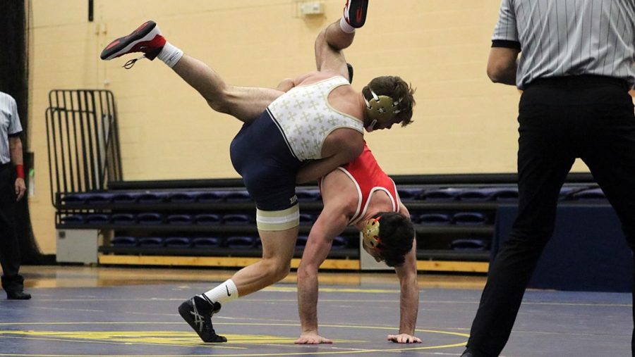 The John Carroll wrestling team dominated against the Otterbein Cardinals on Jan. 16, outmatching their opponents with pures trength and technique. (JCU Sports Info)