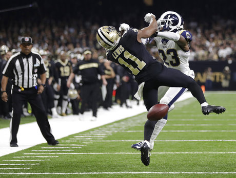 New Orleans Saints wide receiver Tommylee Lewis (11) works for a coach against Los Angeles Rams defensive back Nickell Robey-Coleman (23) during the second half the NFL football NFC championship game Sunday, Jan. 20, 2019, in New Orleans. The Rams won 26-23. (AP Photo/Gerald Herbert)