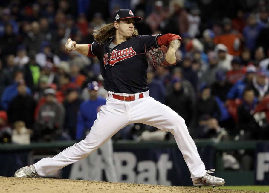 Cleveland Indians starting pitcher Mike Clevinger throws against the Chicago Cubs during the ninth inning of Game 2 of the Major League Baseball World Series Wednesday, Oct. 26, 2016, in Cleveland. (AP Photo/Matt Slocum)