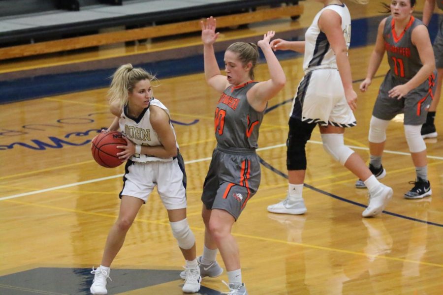 Senior point guard Kahrin Spear looks to get by an Ohio Northern defender in the final home game of the 2018 season for the Blue Streaks women.