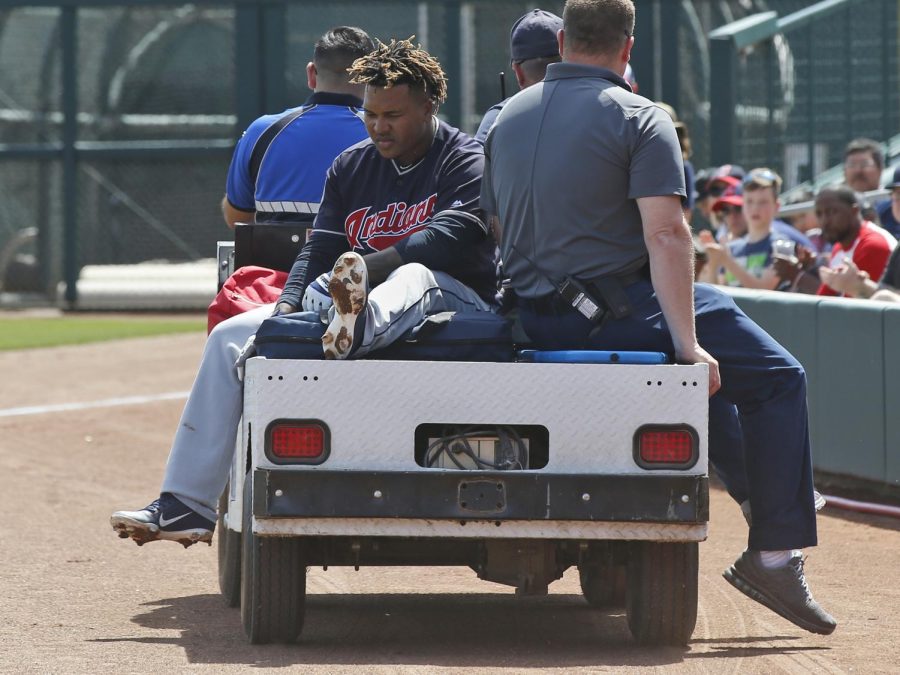 Cleveland Indians Jose Ramirez is taken off the field on a cart after an injury during the third inning of the teams spring training baseball game against the Chicago White Sox on Sunday, March 24, 2019, in Glendale, Ariz. (AP Photo/Sue Ogrocki)