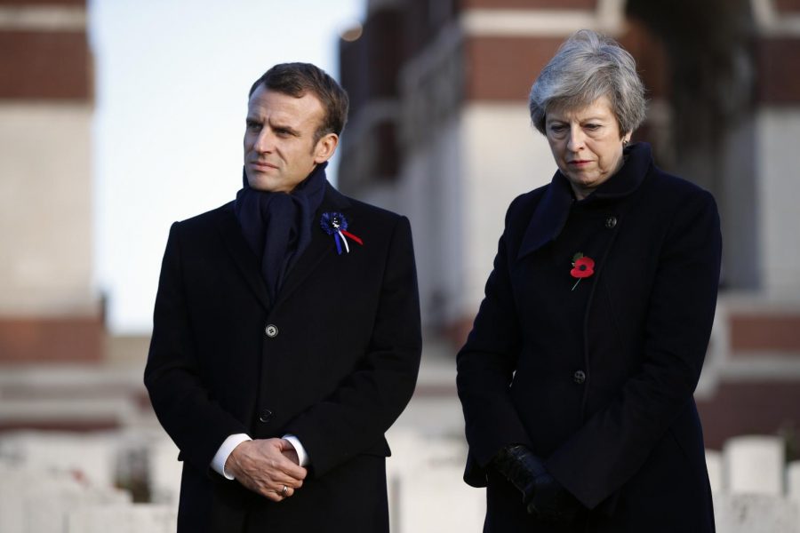 Teresa May and the U.K. are struggling to come to an agreement on Brexit as Macron applies pressures.