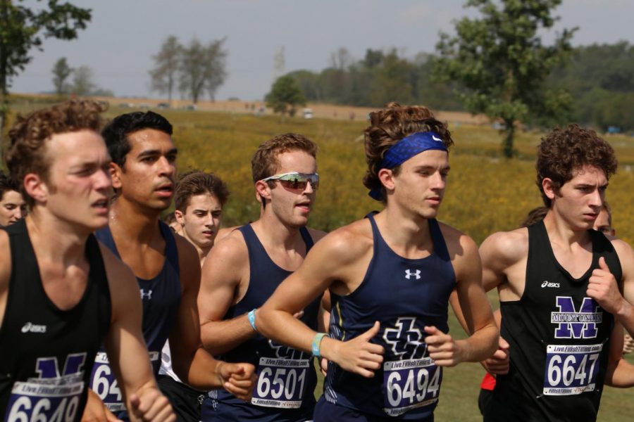 Michael Shipman (pictured middle with sunglasses) and Connor McIntrye (middle-right with headband) compete.