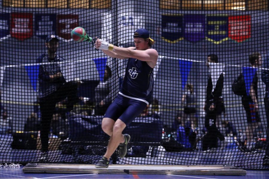 Junior Jacob Fritsch attempts a throw in a competition at Case Western on Saturday, Dec. 7.