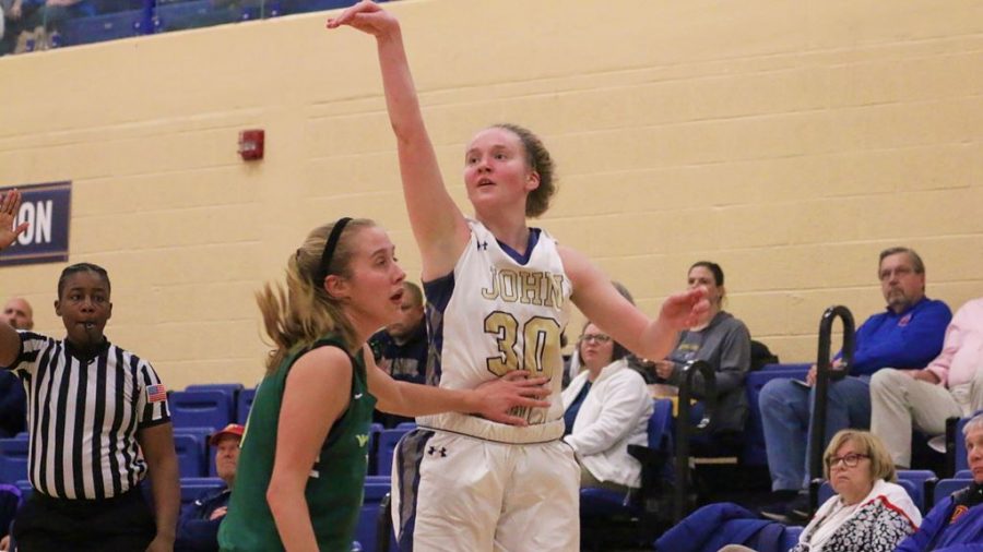 Junior Abby Adler poses after shooting a 3-pointer in the OAC Quarterfinal vs. Wilmington.