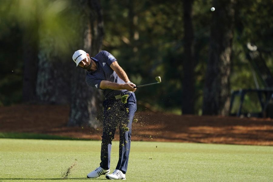 Dustin Johnson hits on the 15th fairway during the final round of the Masters golf tournament Sunday, Nov. 15, 2020, in Augusta, Ga. (AP Photo/Matt Slocum)