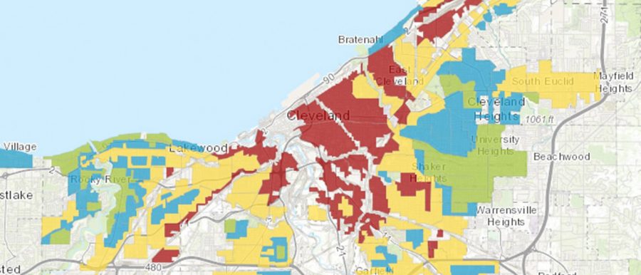 The red color indicates neighborhoods redlined in the 1930s.