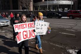 Students march to protest school violence and advocate for harsher gun restrictions. 