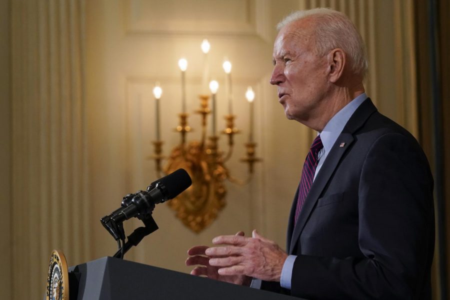 President Joe Biden speaks about the economy in the State Dinning Room of the White House, Friday, Feb. 5, 2021, in Washington. (AP Photo/Alex Brandon)