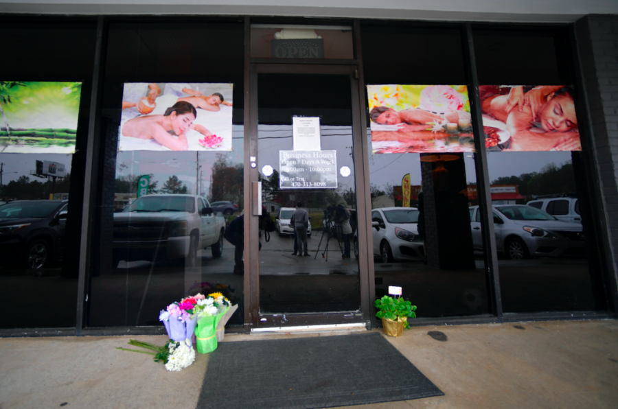 A make-shift memorial is seen outside a business where a multiple fatal shooting occurred on Tuesday, Wednesday, March 17, 2021, in Acworth, Ga. 
