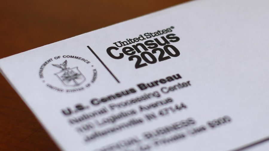 This April 5, 2020, file photo shows an envelope containing a 2020 census letter mailed to a U.S. resident in Detroit. Michigans slow population growth over the past decade will cost the state a U.S. House seat, continuing a decades-long trend as job-seekers and retirees have fled to other states.