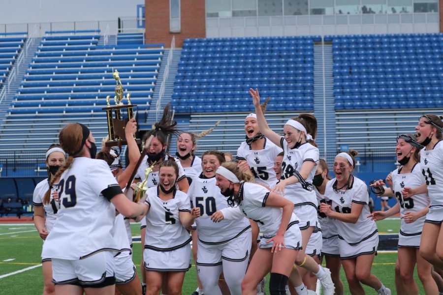 John Carrolls Womens Lacrosse team celebrates after winning the OAC Championship on May 1, 2021. They also clinched a bid to the NCAA Tournament.