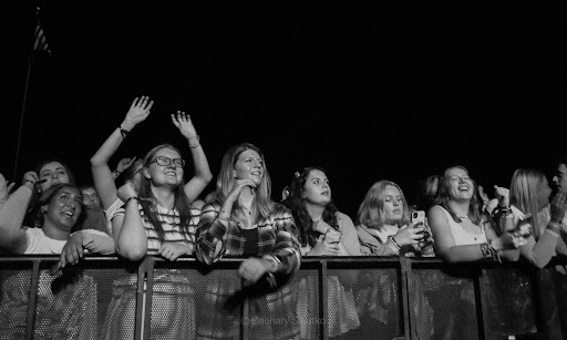 JCU students cheer and dance during the Welcome Back concert.
