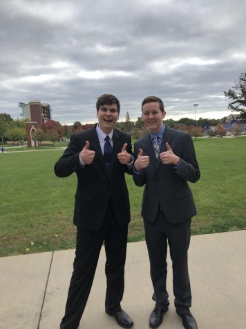 Aiden Keenan ‘22 and Ray Flannery ‘22, both first-years at the time, pose after their first collegiate speech and debate tournament at the University of Akron in Oct. 2018.
(Photo by Aiden Keenan ‘22).