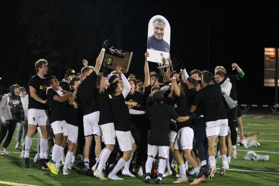 The John Carroll Mens Soccer Team celebrating their fourth straight OAC Championship. The team honored former John Carroll Sports Information Director the late Chris Wenzler by dedicating their season to him. 