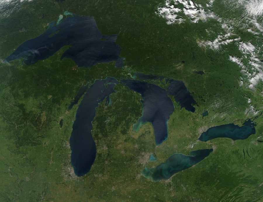 A satellite view of a cloudless summer day over the Great Lakes region.