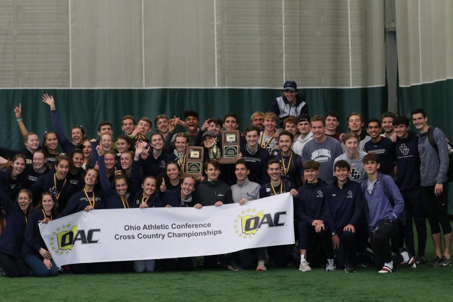 The John Carroll University Mens and Womens Cross Country Team after winning both OAC Championship titles on Saturday, Oct. 30 at Wilmington College. 