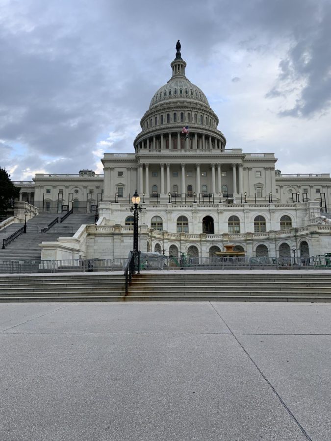 The US Capitol building contrasts the dark clouds in the sky. 
(Photo by Aiden Keenan ‘22).