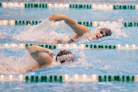 John Carrolls Anna Glass competing in a swim meet earlier this season 