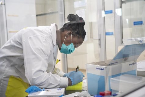 Medical scientist Melva Mlambo, works in sequencing COVID-19 omicron samples at the Ndlovu Research Center in Elandsdoorn, South Africa Wednesday Dec. 8, 2021. 