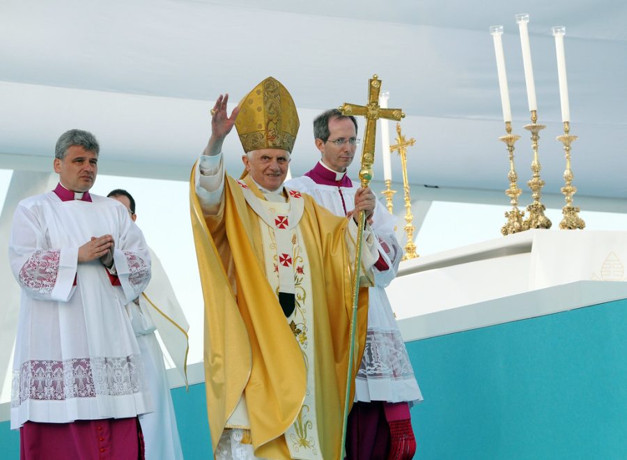 Pope Benedict XVI waves to the crowd as he arrives for an open-air mass in the Terreiro do Paso in Lisbon, on May 11, 2010.