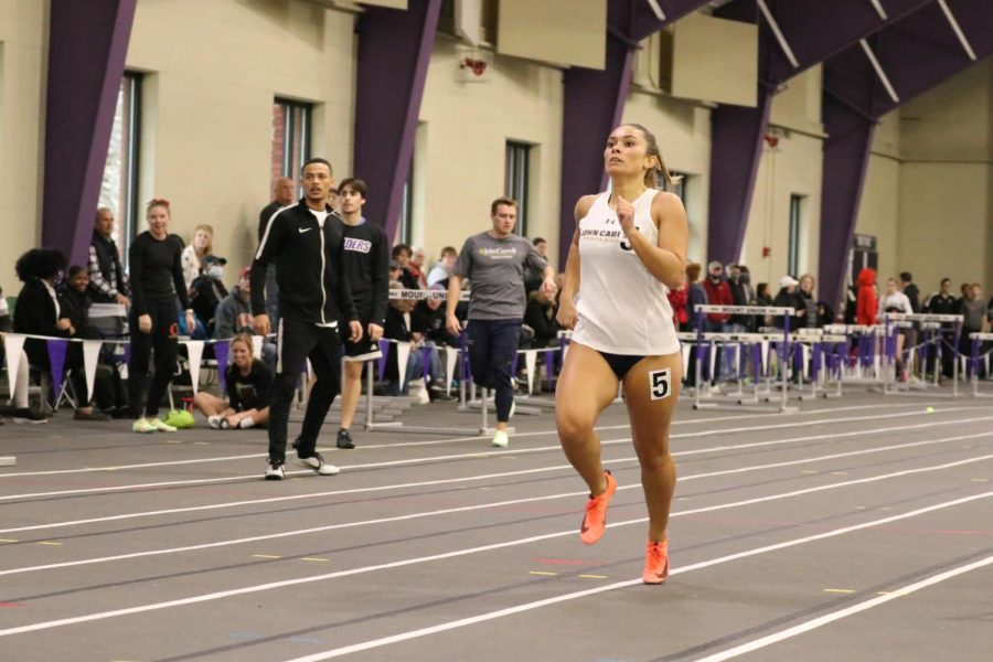 Lucia Cannata competing in the OAC Indoor Track & Field Championship. Cannata received All-OAC honors in the 200 meter and 400 meter race.