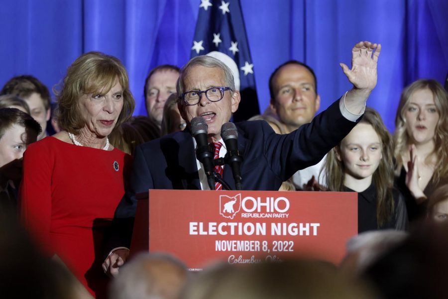 Republican Ohio Gov. Mike DeWine, center, speaks during an election night watch party as his wife, Fran, stands next to him Tuesday, Nov. 8, 2022, in Columbus, Ohio.