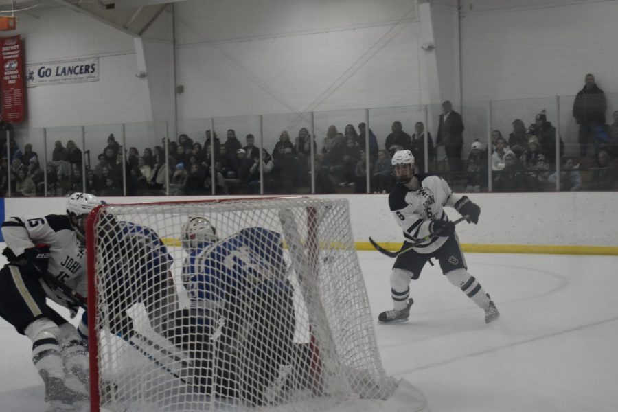 Adam Unruh takes a shot on goal during the Saturday game against Buffalo.