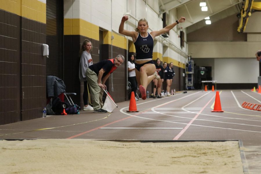Genevieve Arnold competes in the triple jump at the second day of the OAC Championship last weekend.
