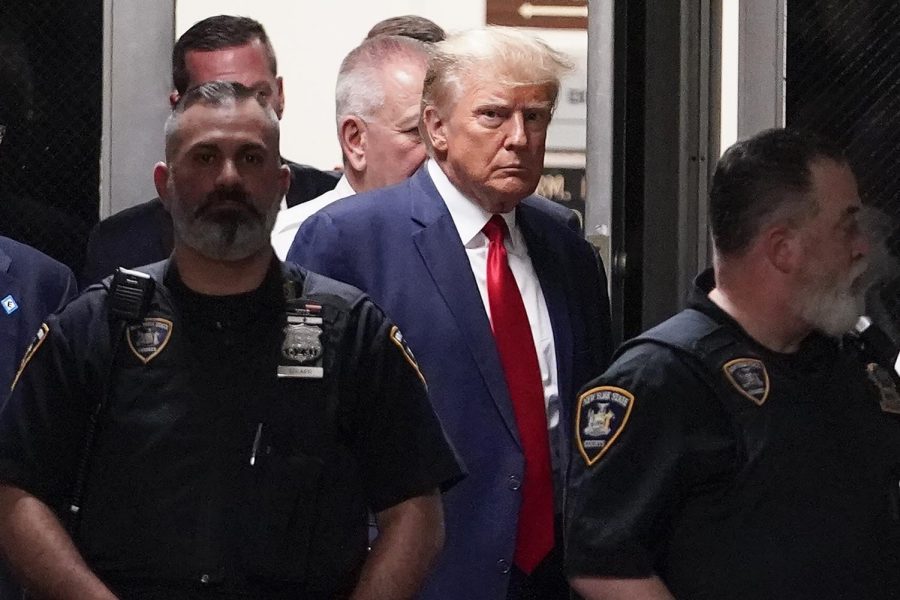 Former President Donald Trump arrives at court, Tuesday, April 4, 2023, in New York. Trump is set to appear in a New York City courtroom on charges related to falsifying business records in a hush money investigation, the first president ever to be charged with a crime.