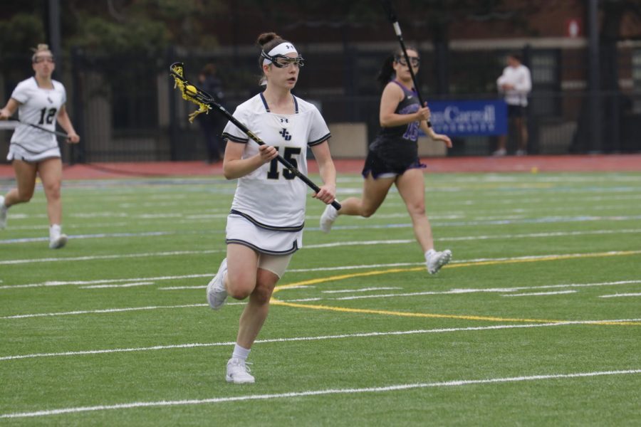 Mary Doherty works her way up the field for John Carroll as she remains a consistent threat for the Blue and Gold.