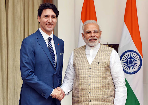 Prime Ministers Trudeau and Modi Shaking hands at a summit on Feb. 23, 2018 - Hyderabad House, New Delhi.