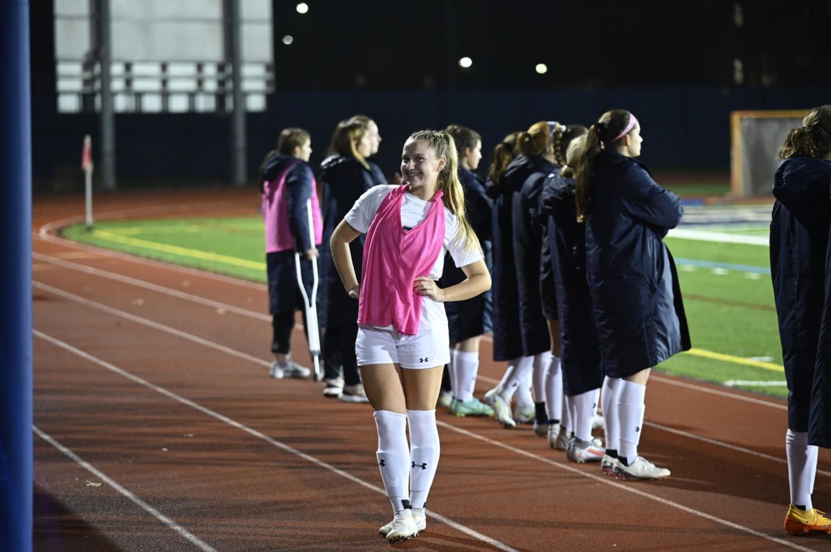 Wohleber smiles during a home game from the last womens soccer season