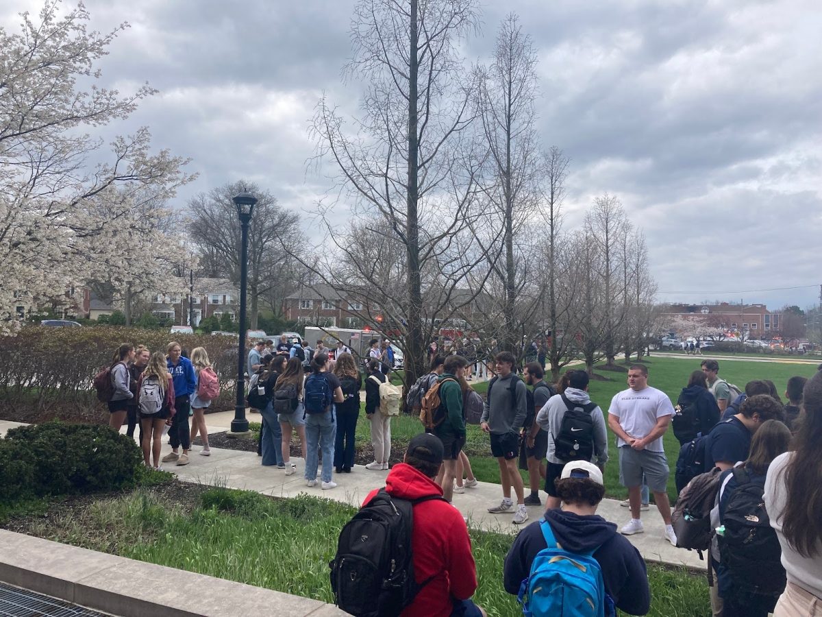 Students and staff evacuating from Dolan Science Center for an active fire alarm.