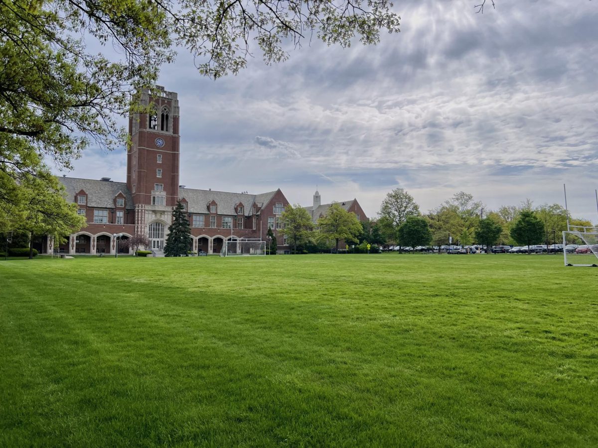 A verdantly trimmed Hamlin Quad reflects the spring sunlight.