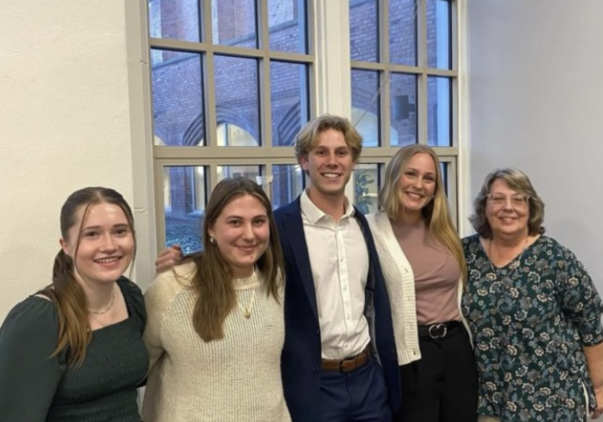 The 2024-2025 leadership board of JCU’s PRSSA. From left to right: Ella Grashoff ’26 (secretary/treasurer), Ruby Tutino ’26 (public relations manager), Collin O’Bryan ’25 (vice president), Kara Grose ’25 (president) and Jill Bernaciak (advisor) (JCU’s PRSSA).