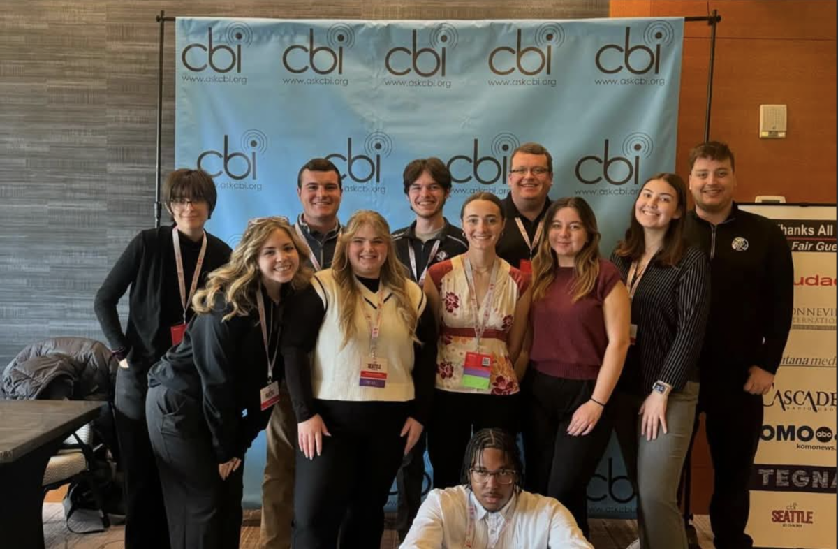 The award-winning WJCU directors board poses at the College Broadcasters Inc.