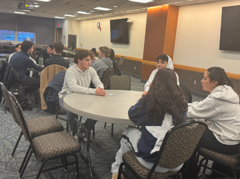 Students break out into small groups during the Student Government meeting