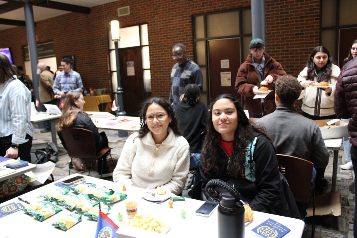 Students proudly display food from Belize as a part of the "Taste for Travel" event.