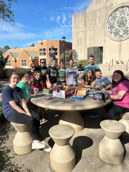 The Best Buddies Student Organization relaxes with new friends on a sunny day