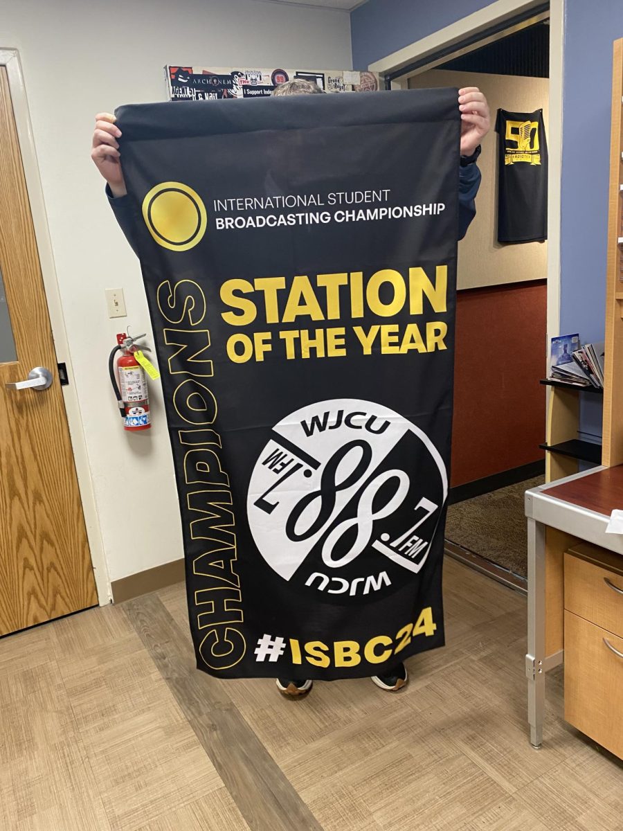 This banner proudly announces that WJCU 88.7 FM is the winner of the ISBC Station of the Year award.