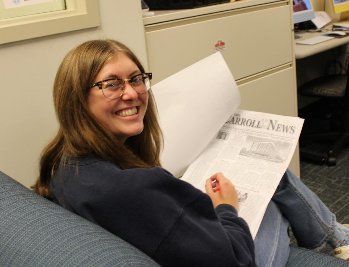 Grace Sherban edits the first print edition of The Carroll News since 2020.