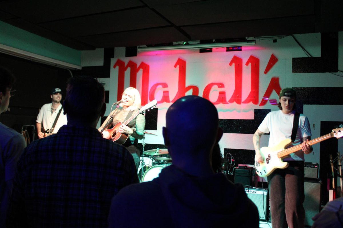Eliza & The Delusionals soaking up the stage lights as they continue their set.