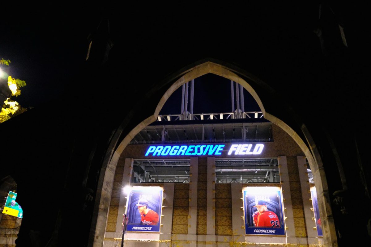 The entrance to Erie Street Cemetery, nestled beneath the lights of Progressive Field.  