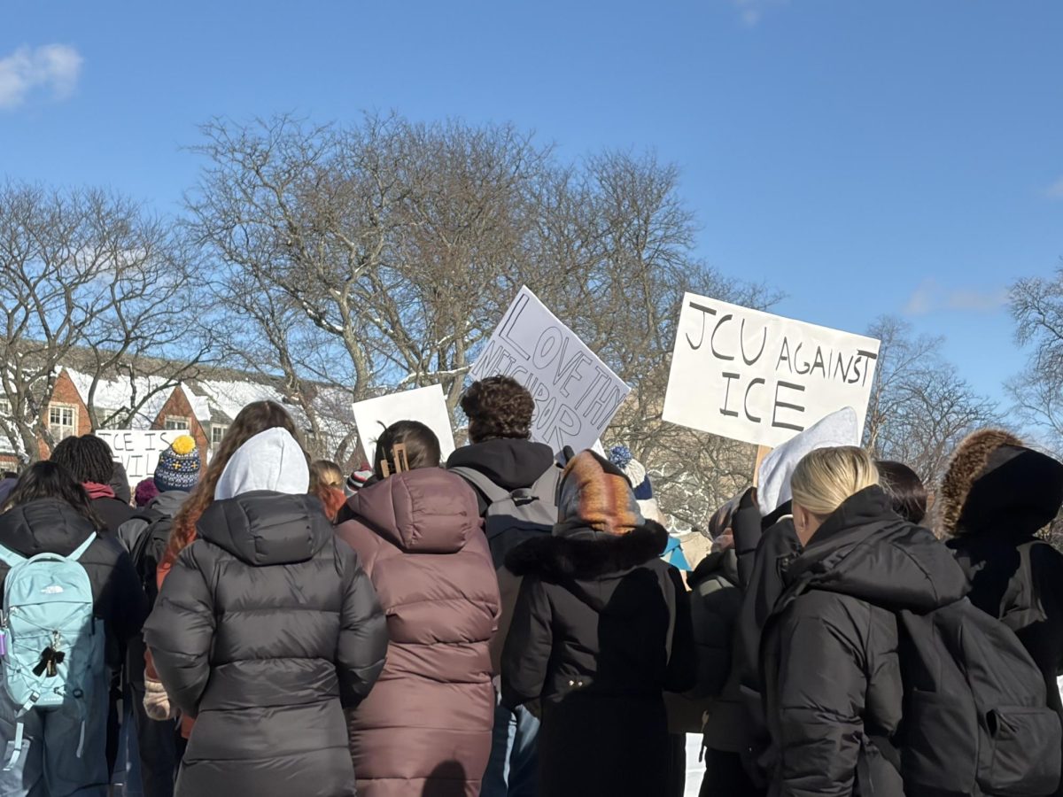 Many John Carroll students carried signs to protest the actions of ICE.
